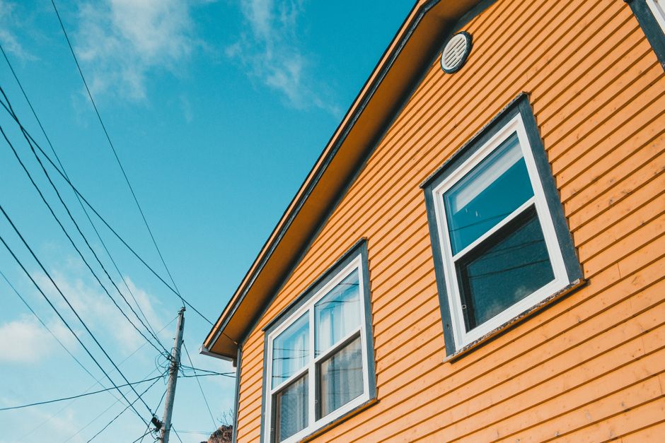 Painted yellow wooden house exterior